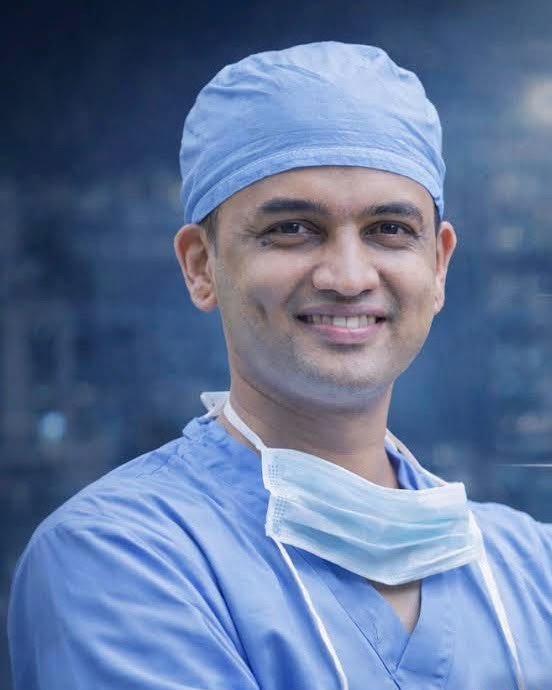 Dr. Kishan Rao in surgical scrubs